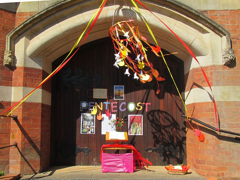 Church door celebrating Pentecost